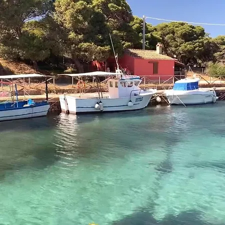 Casa Luna A Сasa de vacaciones Porto Pino